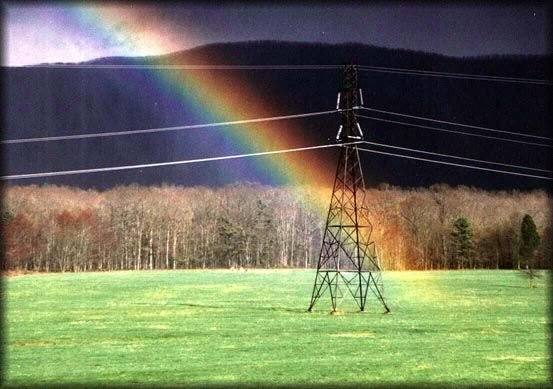 Rainbow after thunderstorm.  Photo taken from my house.